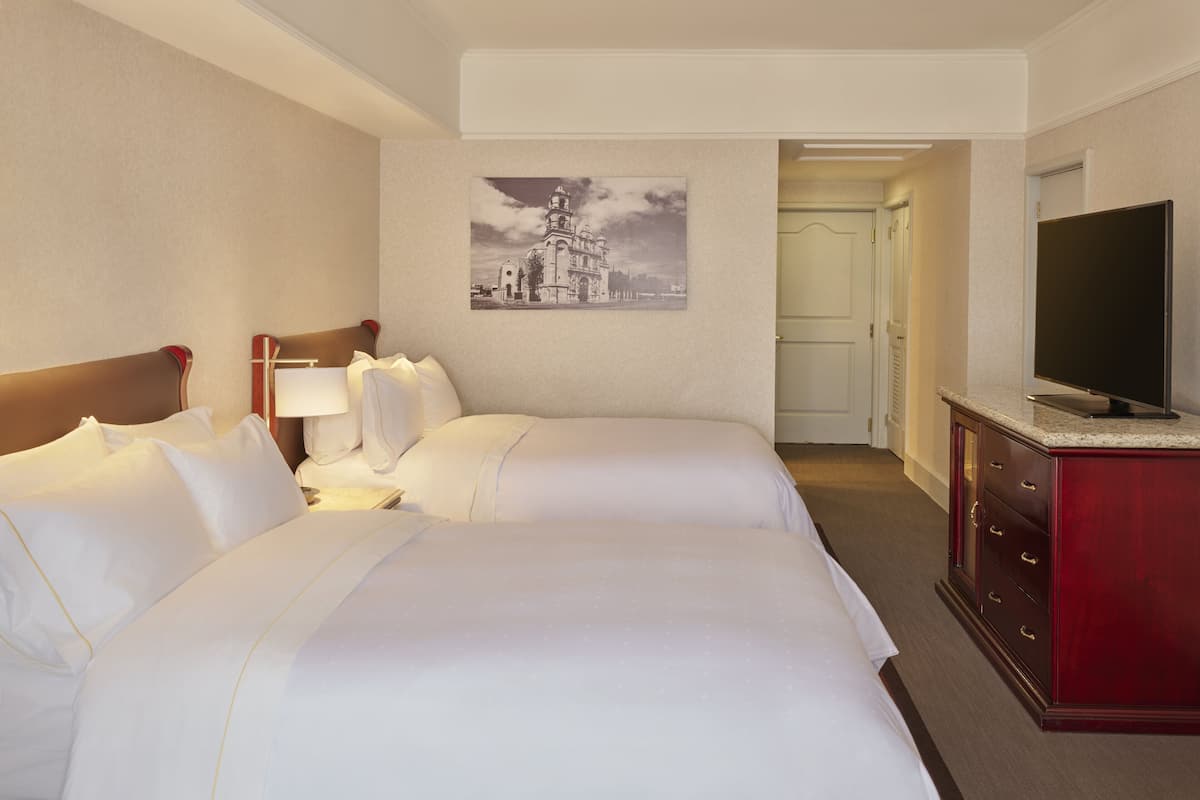 Premium bedding, down comforters, pillowtop beds, in-room safe