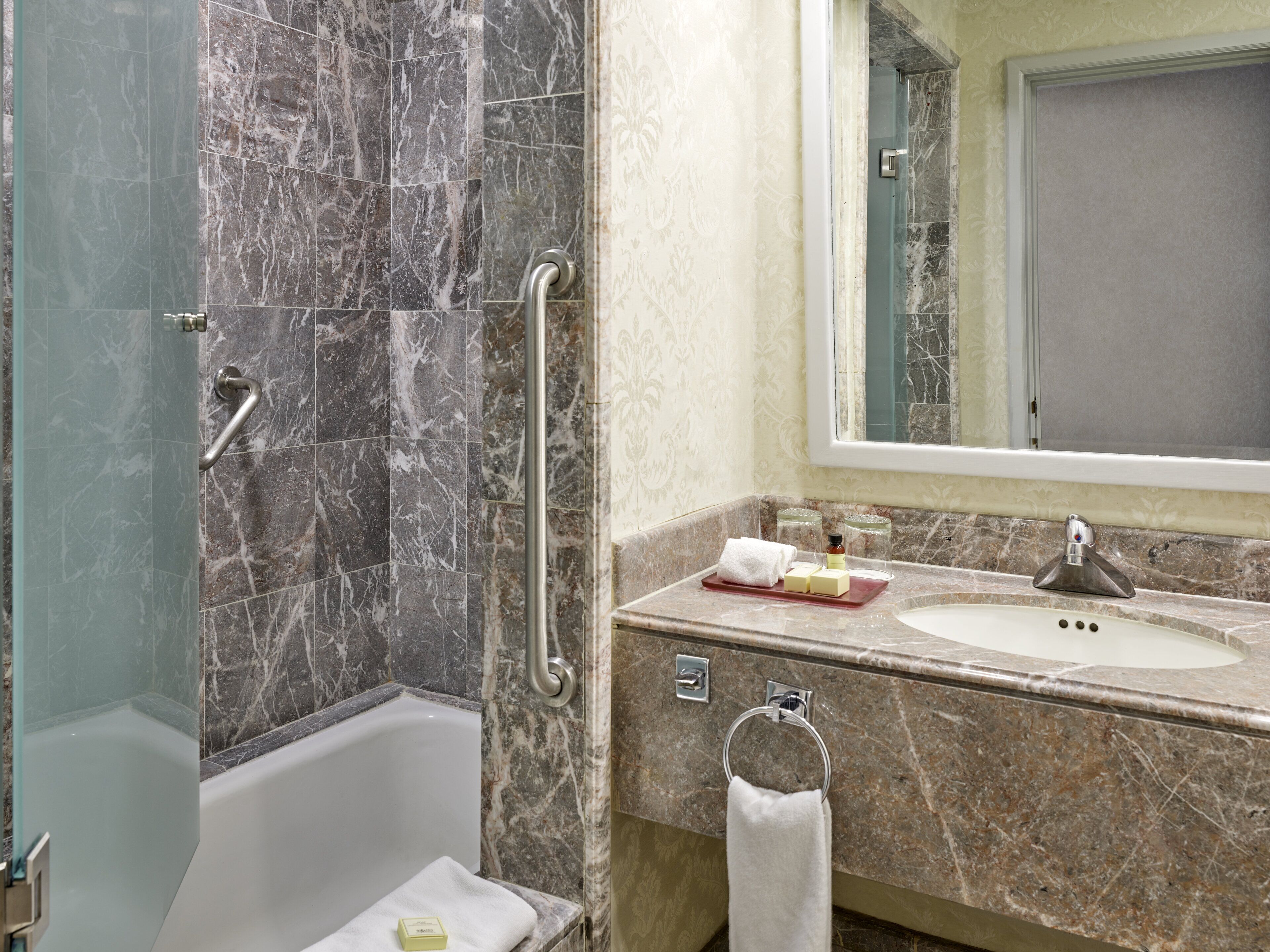 combined shower/bathtub, deep-soaking bathtub, free toiletries