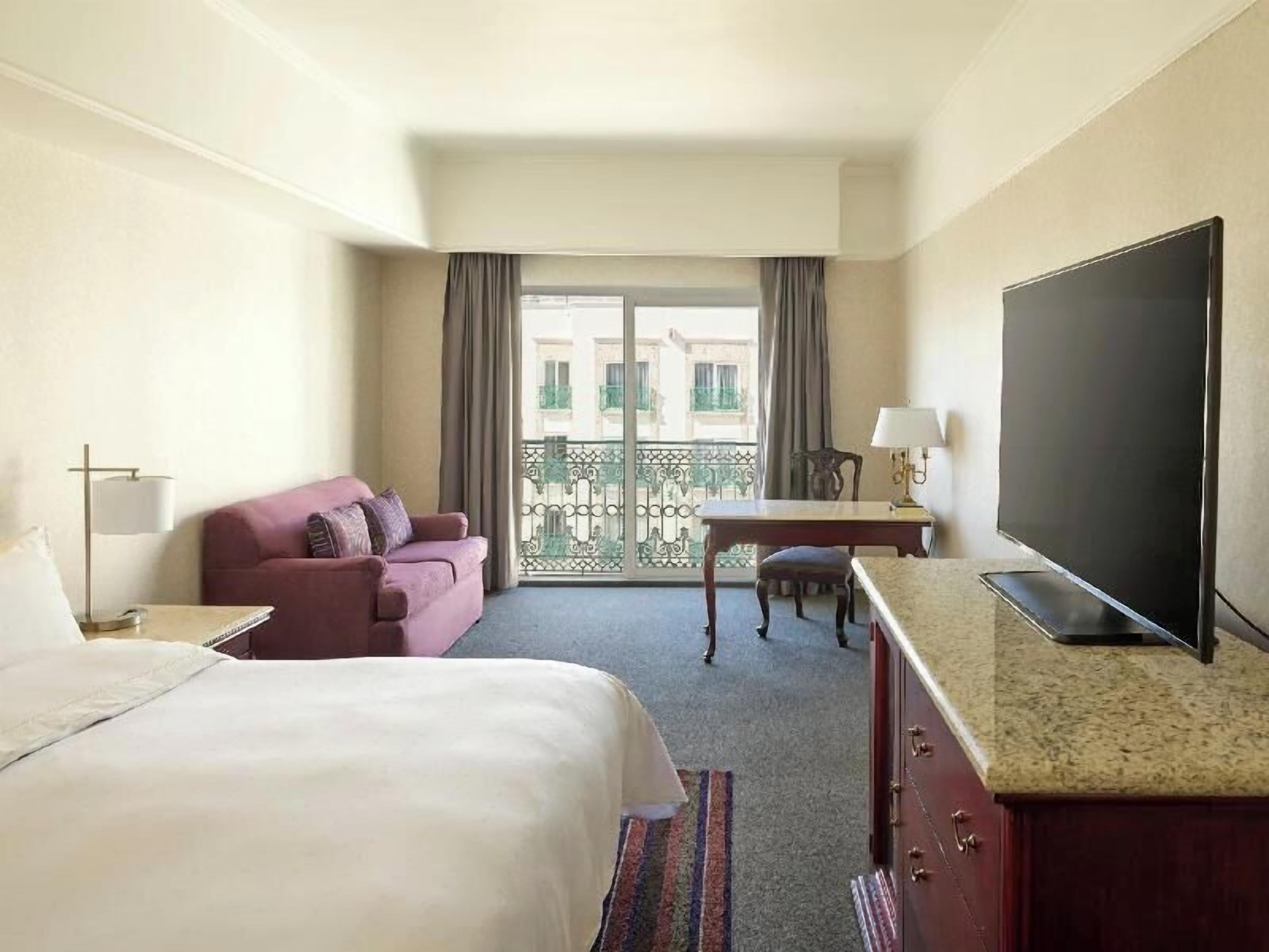 Premium bedding, down duvets, pillow-top beds, in-room safe