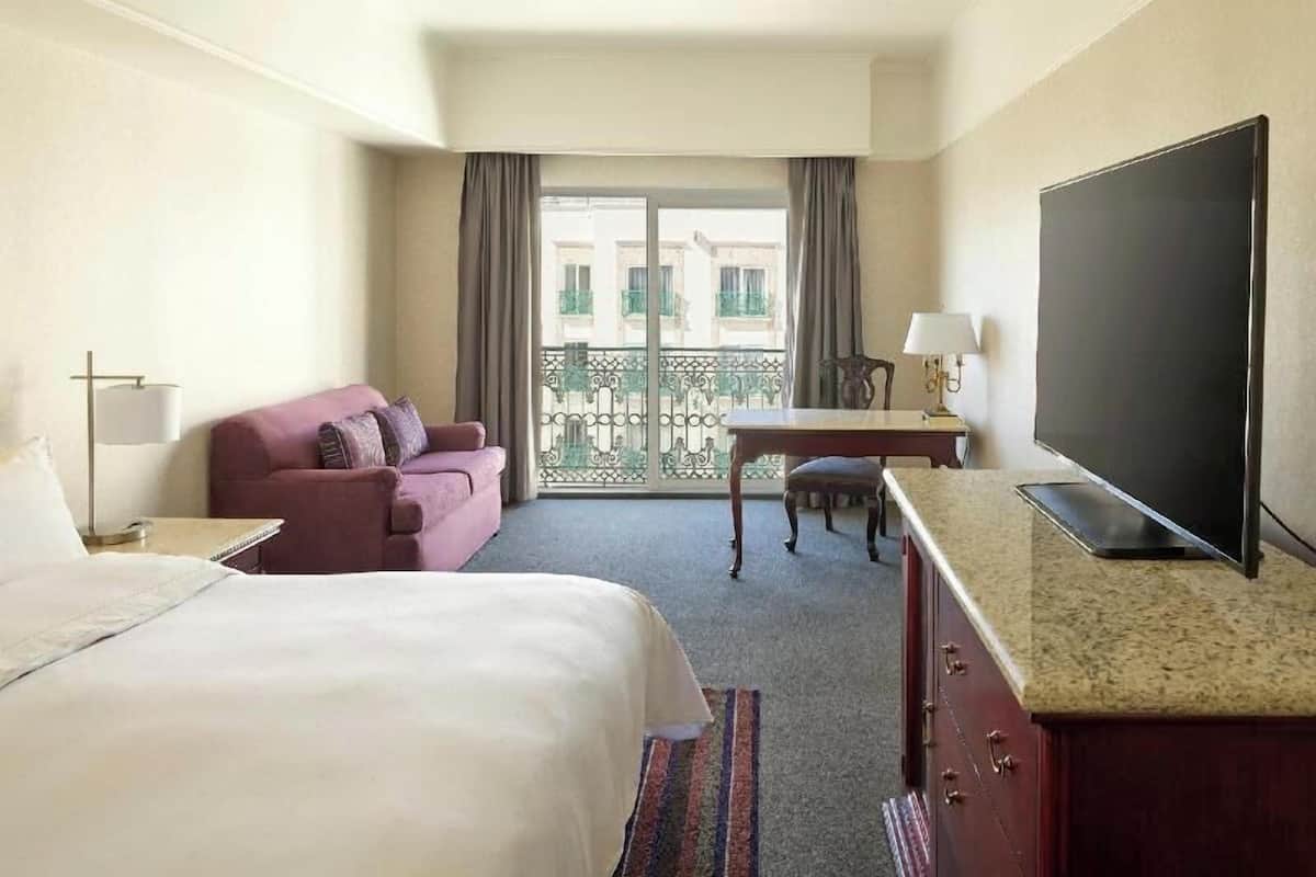 Premium bedding, down comforters, pillowtop beds, in-room safe