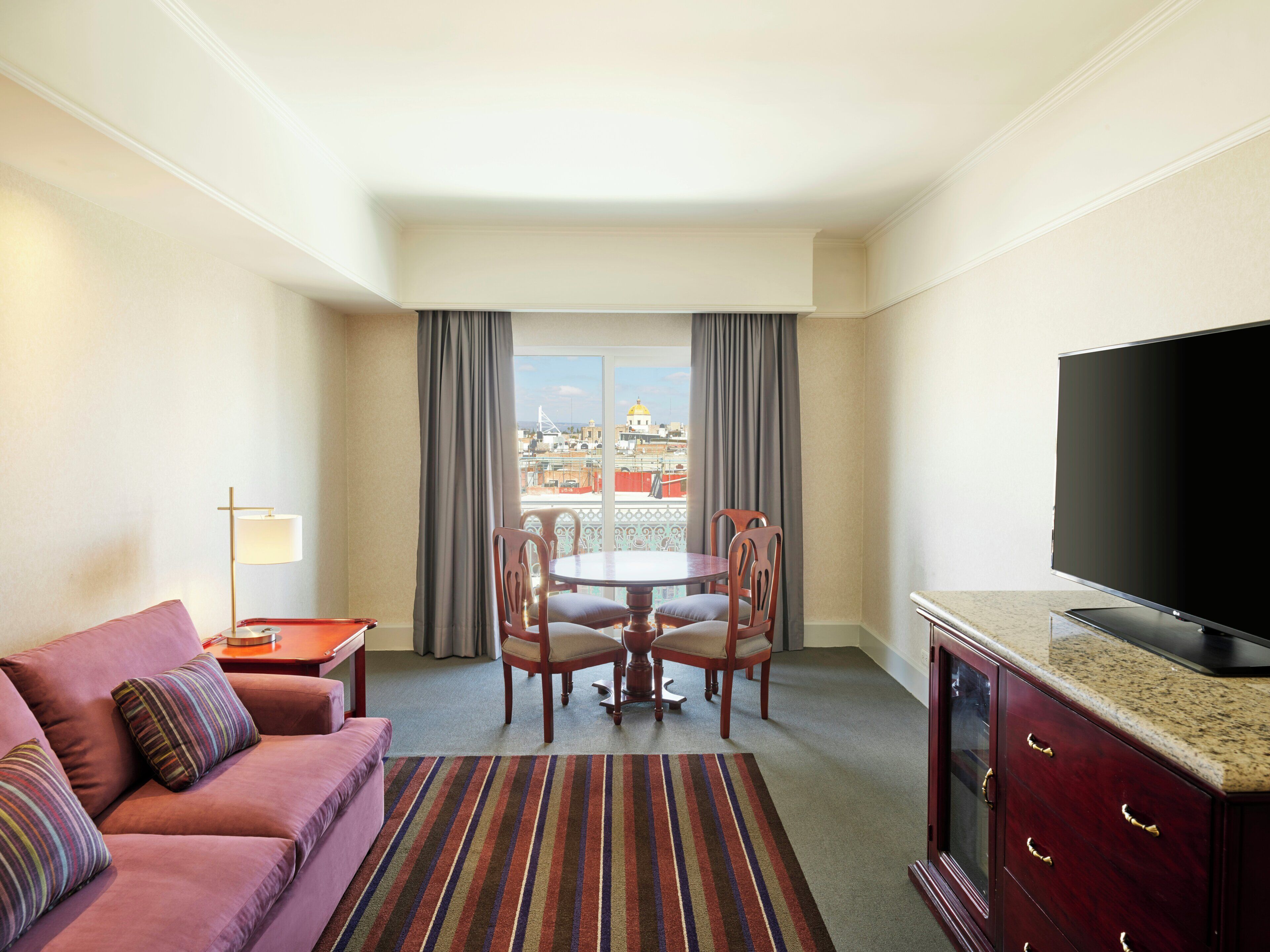 Premium bedding, down comforters, pillowtop beds, in-room safe