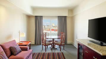 Premium bedding, down comforters, pillowtop beds, in-room safe