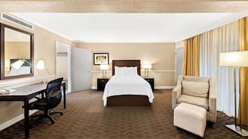 Family Suite, 1 King Bed, Refrigerator & Microwave, Pool View | Desk, laptop workspace, iron/ironing board, cribs/infant beds