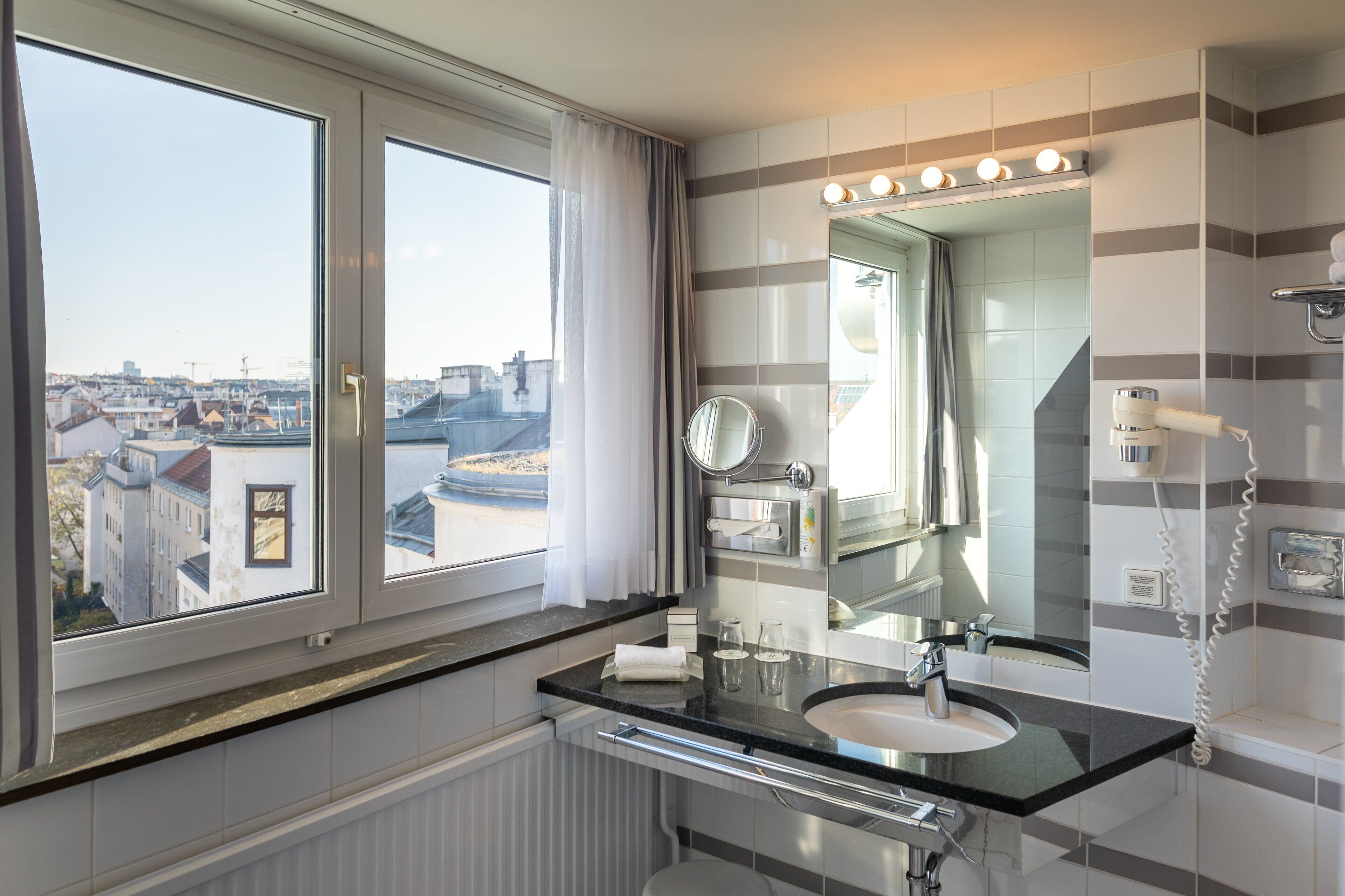 standard room, 1 king bed, city view (top floor) | bathroom | shower, free toiletries, hair dryer, slippers