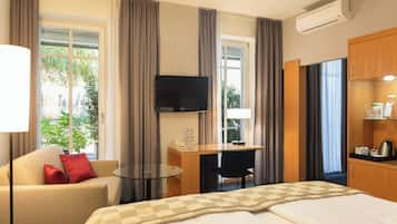 Standard Room, 1 King Bed (Garden Wing) | Hypo-allergenic bedding available, minibar, in-room safe, desk
