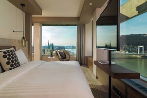 Premium bedding, pillow-top beds, minibar, in-room safe