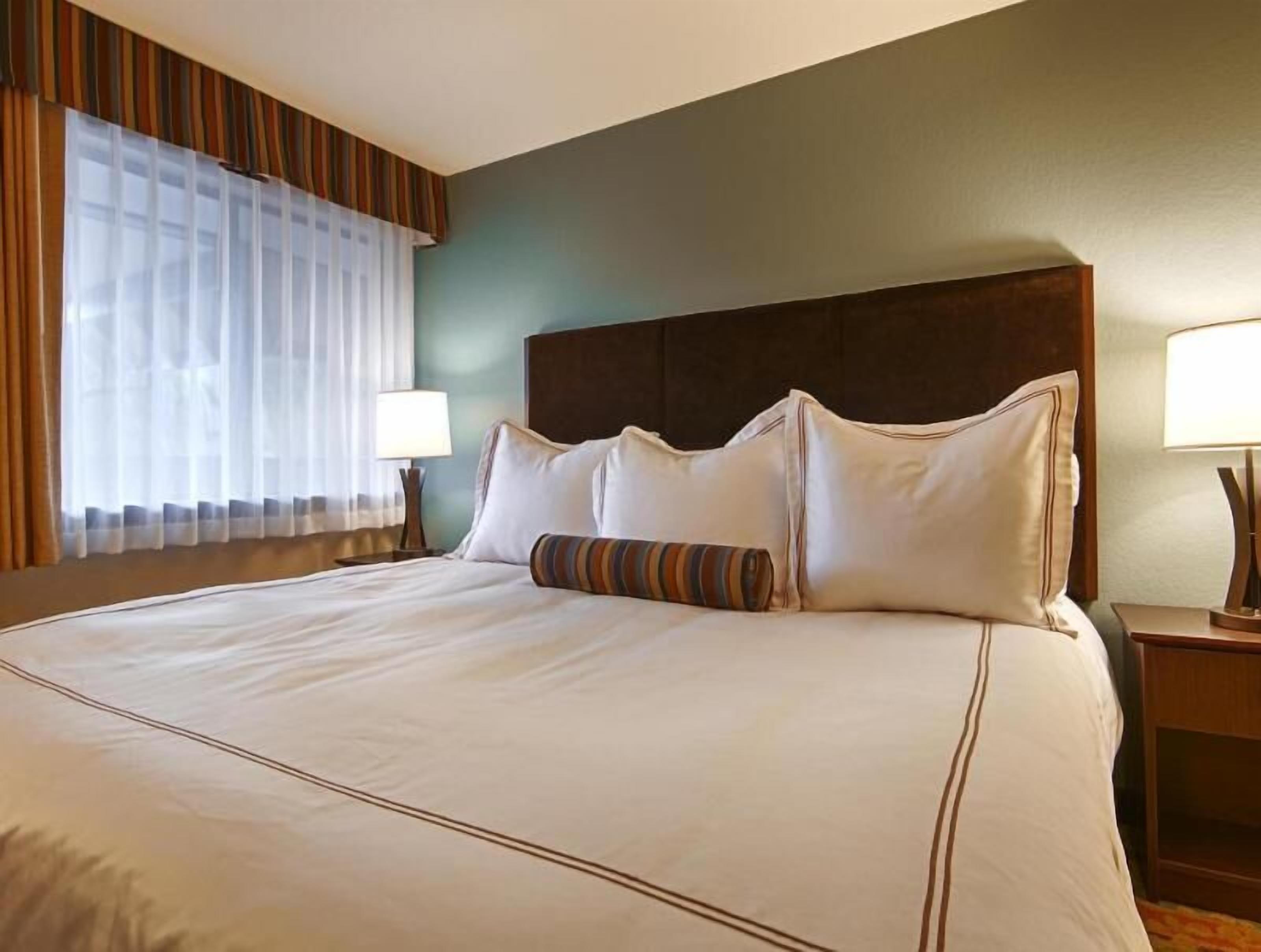 Desk, laptop workspace, blackout curtains, iron/ironing board