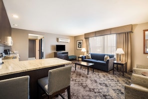 Suite, 1 King Bed, Non Smoking, Kitchen | Private kitchen | Fridge, coffee/tea maker, eco-friendly cleaning products