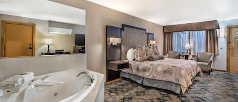 Suite, 1 kingsize bed, niet-roken, bubbelbad | Een bureau, een laptopwerkplek, verduisterende gordijnen