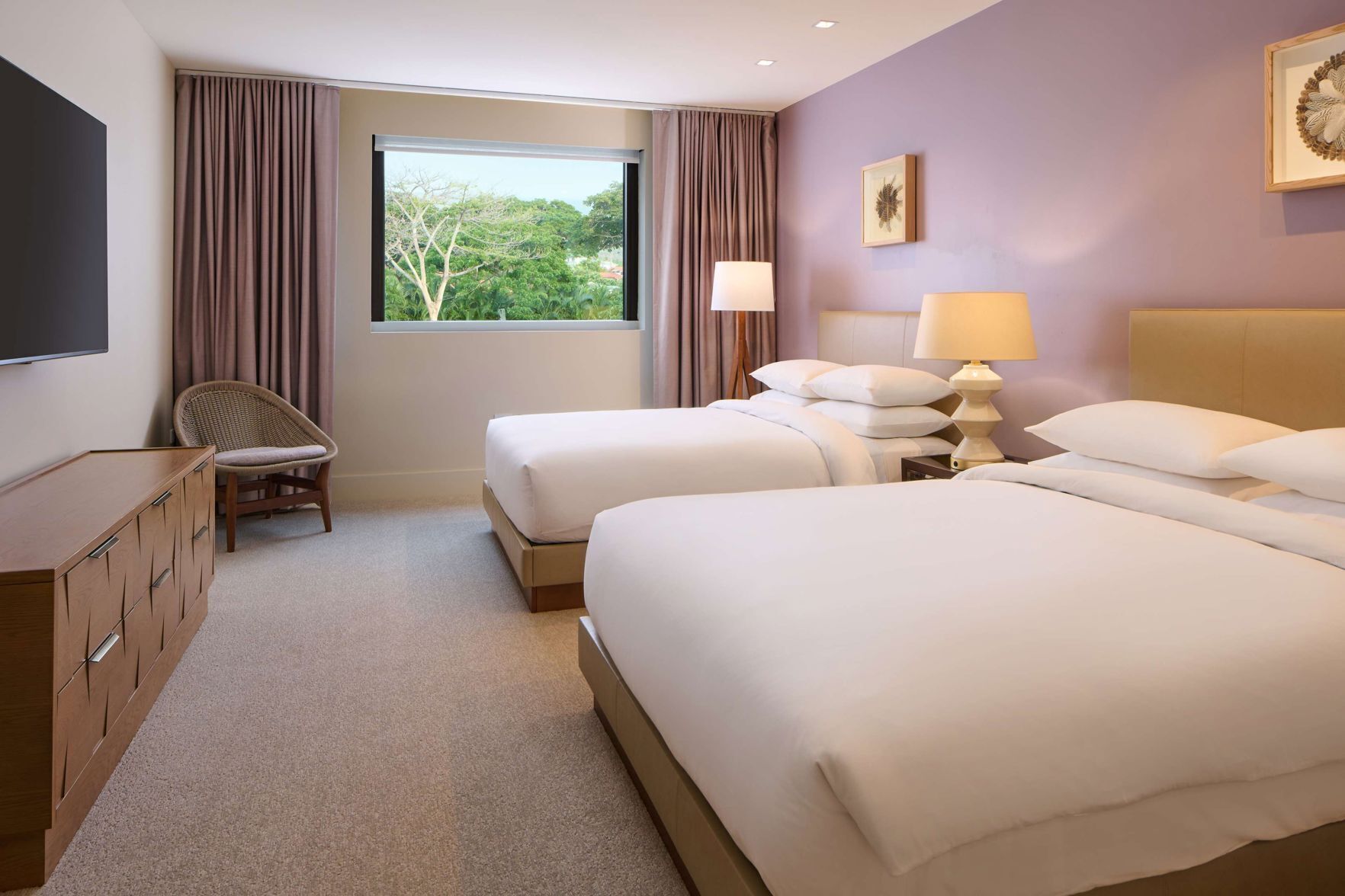 Premium bedding, down comforters, free minibar items, in-room safe