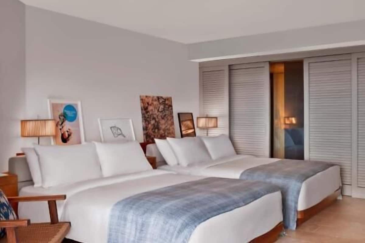 Ropa de cama de alta calidad, edredón y artículos del minibar gratis