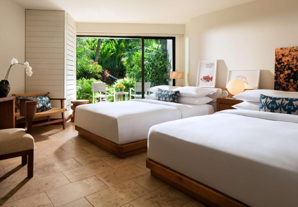 Premium bedding, down comforters, free minibar items, in-room safe