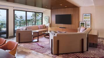 3 Bedroom Ilikai Penthouse, Ocean View (2 Kings and 2 Queens) | Living room | 40-inch TV with cable channels, pay movies