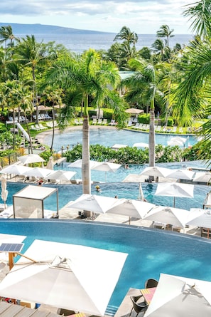 5 outdoor pools, cabanas (surcharge), pool umbrellas