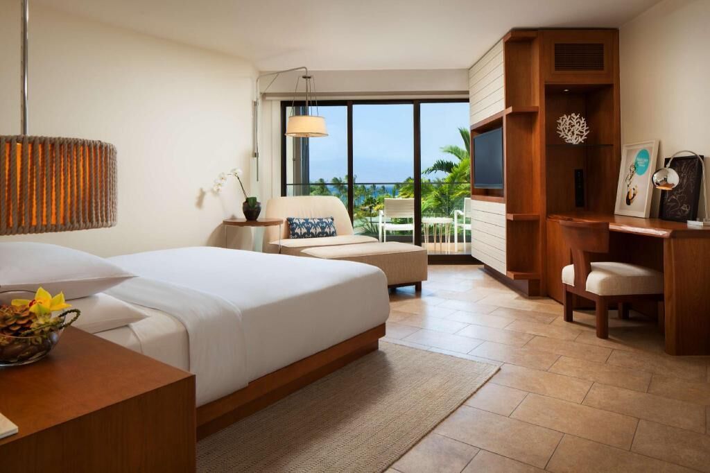 Premium bedding, down comforters, free minibar items, in-room safe