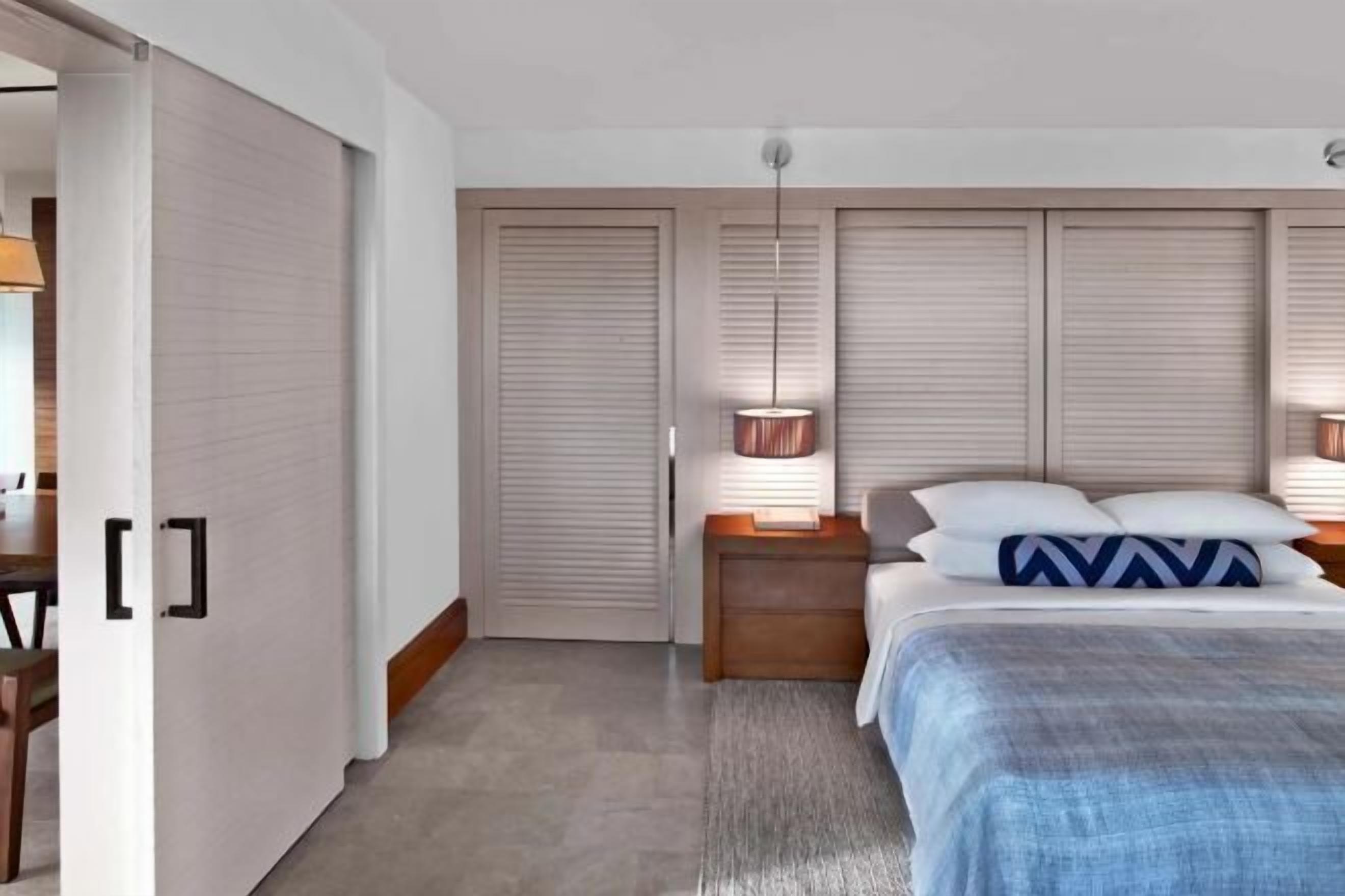 Premium bedding, down comforters, free minibar items, in-room safe