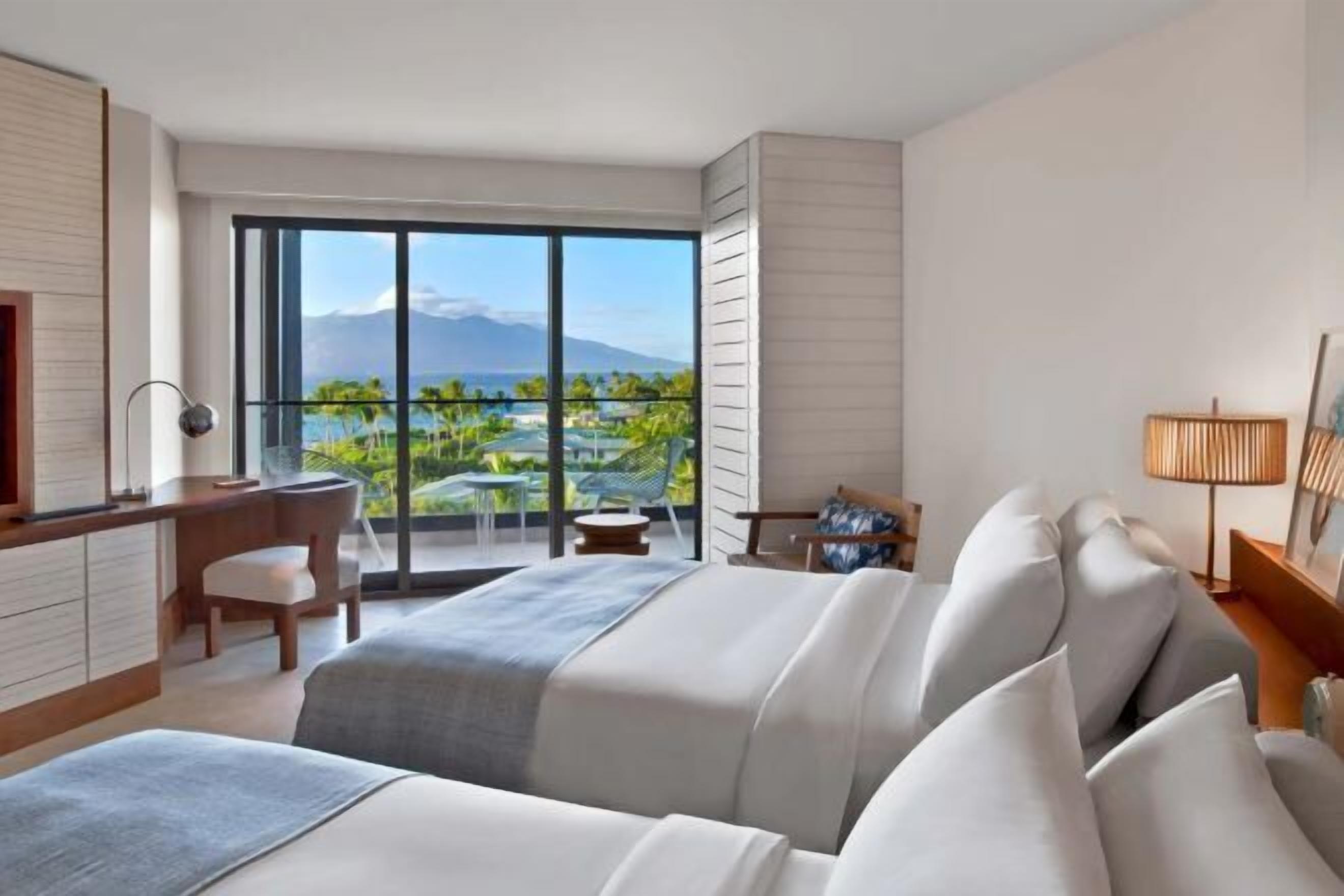 Premium bedding, down comforters, free minibar items, in-room safe