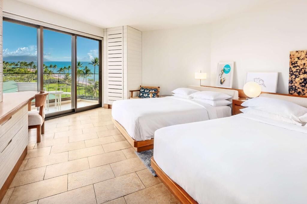 Premium bedding, down comforters, free minibar items, in-room safe