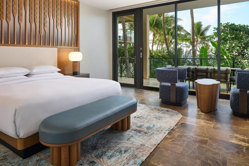 Premium bedding, down comforters, free minibar items, in-room safe