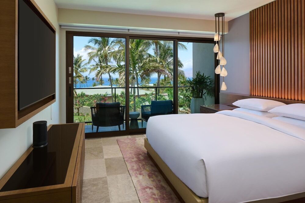 Premium bedding, down comforters, free minibar items, in-room safe