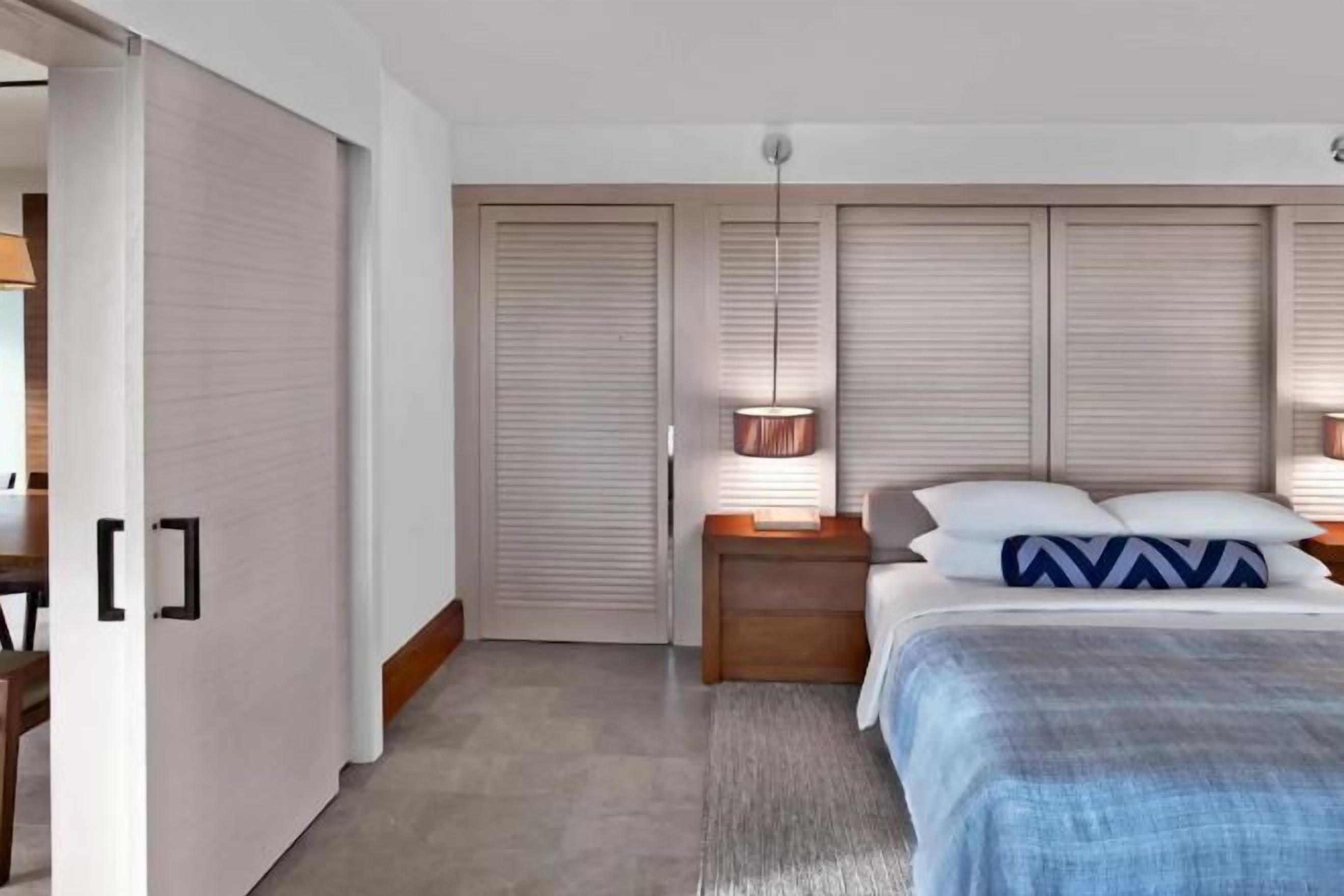 Premium bedding, down comforters, free minibar items, in-room safe