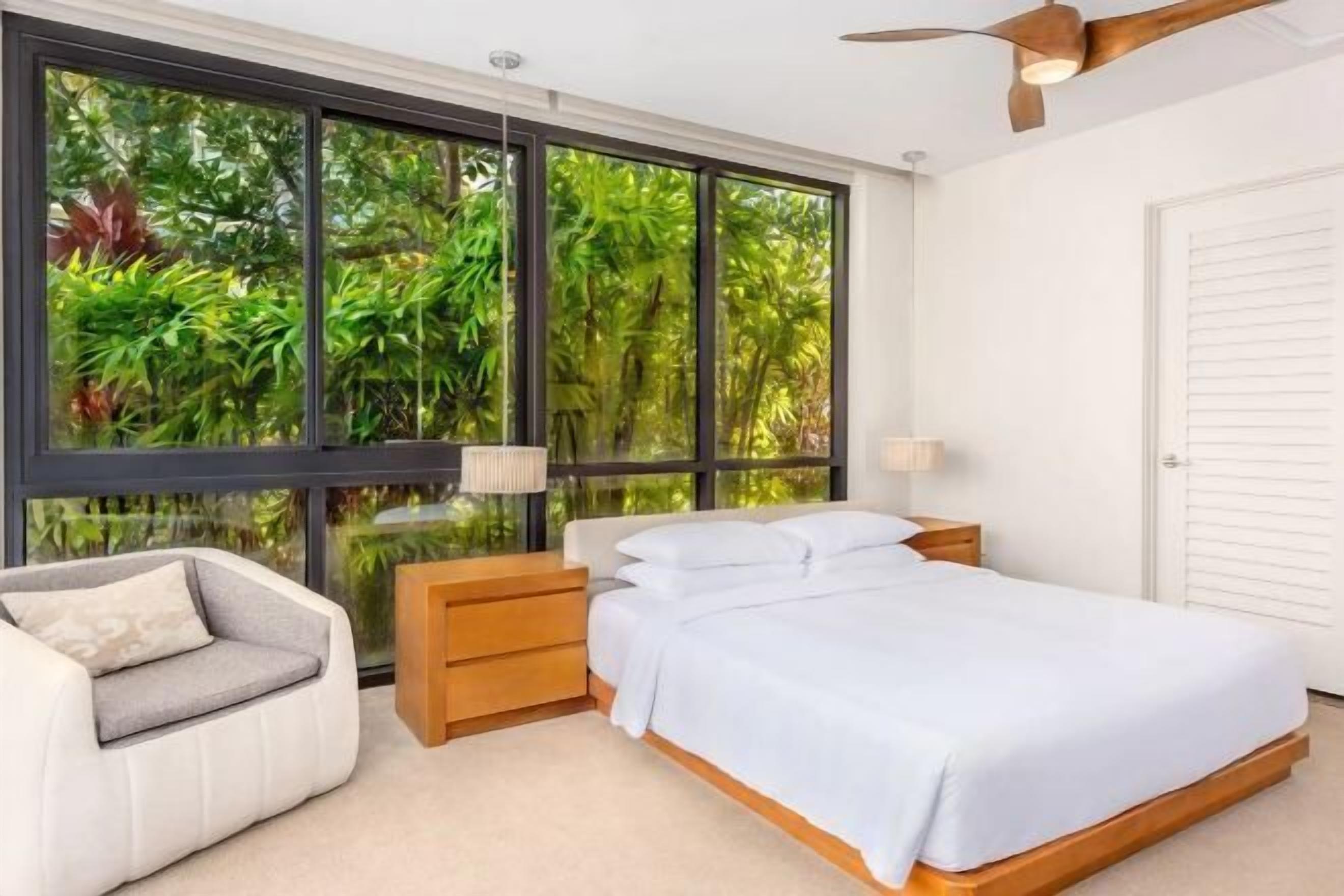 Premium bedding, down comforters, free minibar items, in-room safe