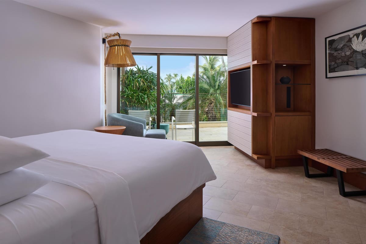 Premium bedding, down comforters, free minibar items, in-room safe