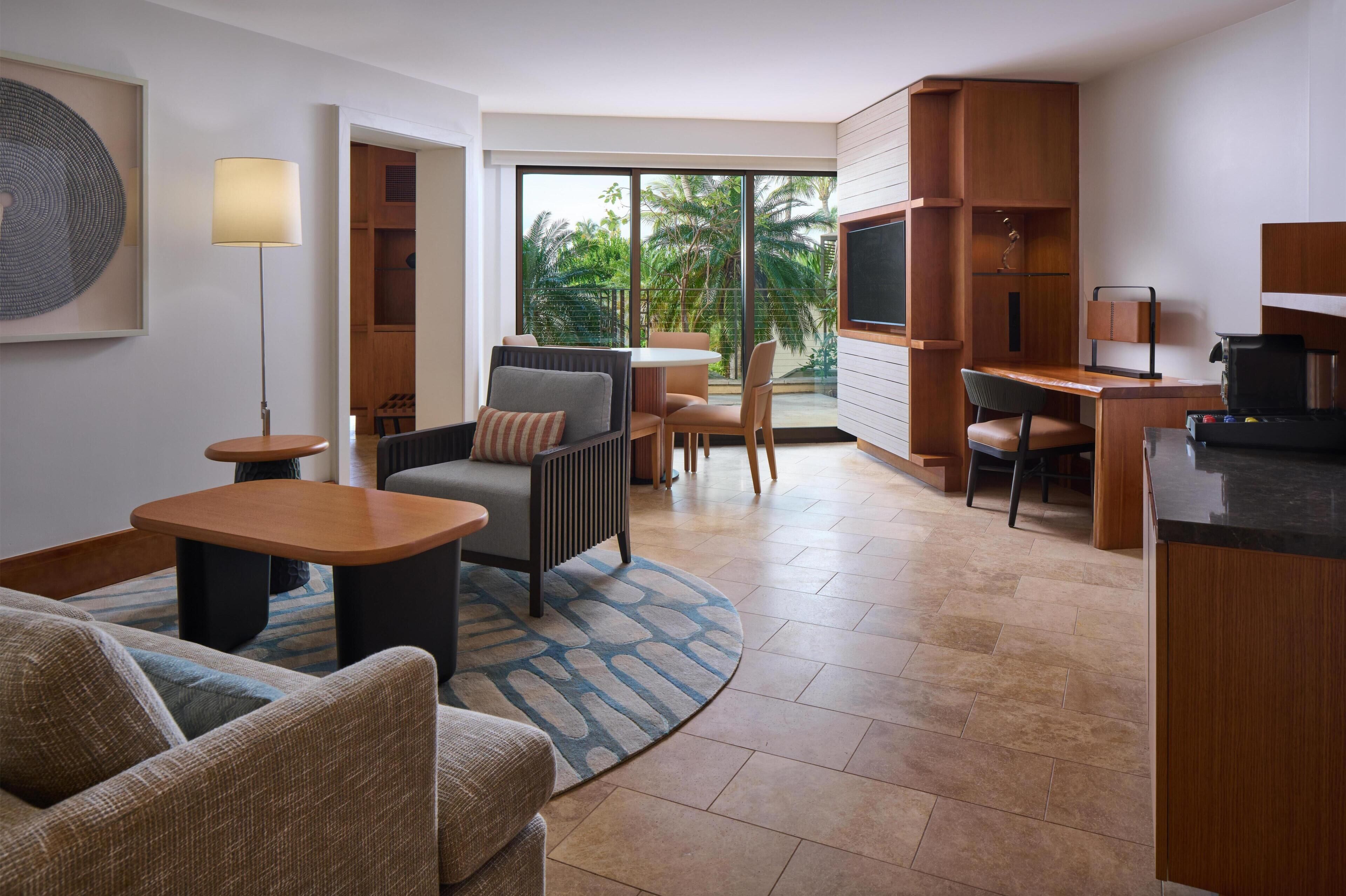 Andaz Suite | Living area | 40-inch TV with cable channels, pay movies