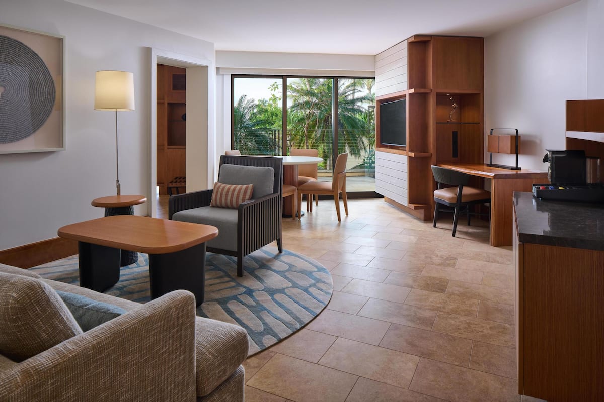 Andaz Suite | Living area | 40-inch TV with cable channels, pay movies