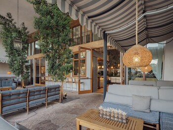 2 outdoor pools, cabanas (surcharge), pool umbrellas at The Scott Resort & Spa