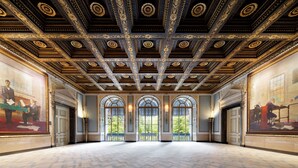 A grand hall with ornate ceiling and large windows. - The Langham, Boston (Boston)