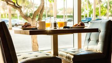 Daily buffet breakfast (USD 25 per person)