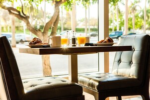 Daily buffet breakfast (USD 25 per person)