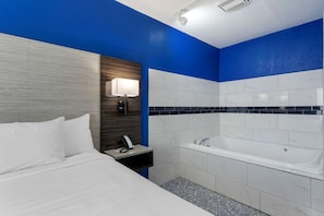 Premium bedding, desk, blackout drapes, iron/ironing board