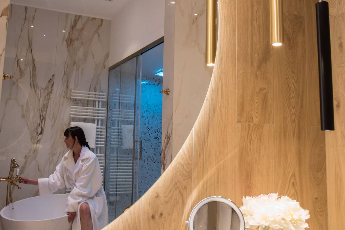 presidential suite | bathroom | eco-friendly toiletries, hair dryer, slippers, bidet