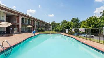 Seasonal outdoor pool, open 9:00 AM to 10:00 PM, pool loungers