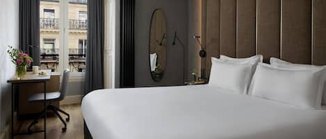 Ropa de cama de alta calidad y minibar