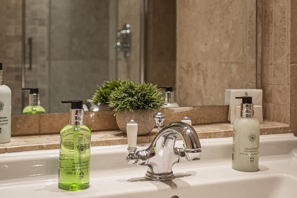 superior twin room | bathroom | eco-friendly toiletries, hair dryer, bathrobes, slippers