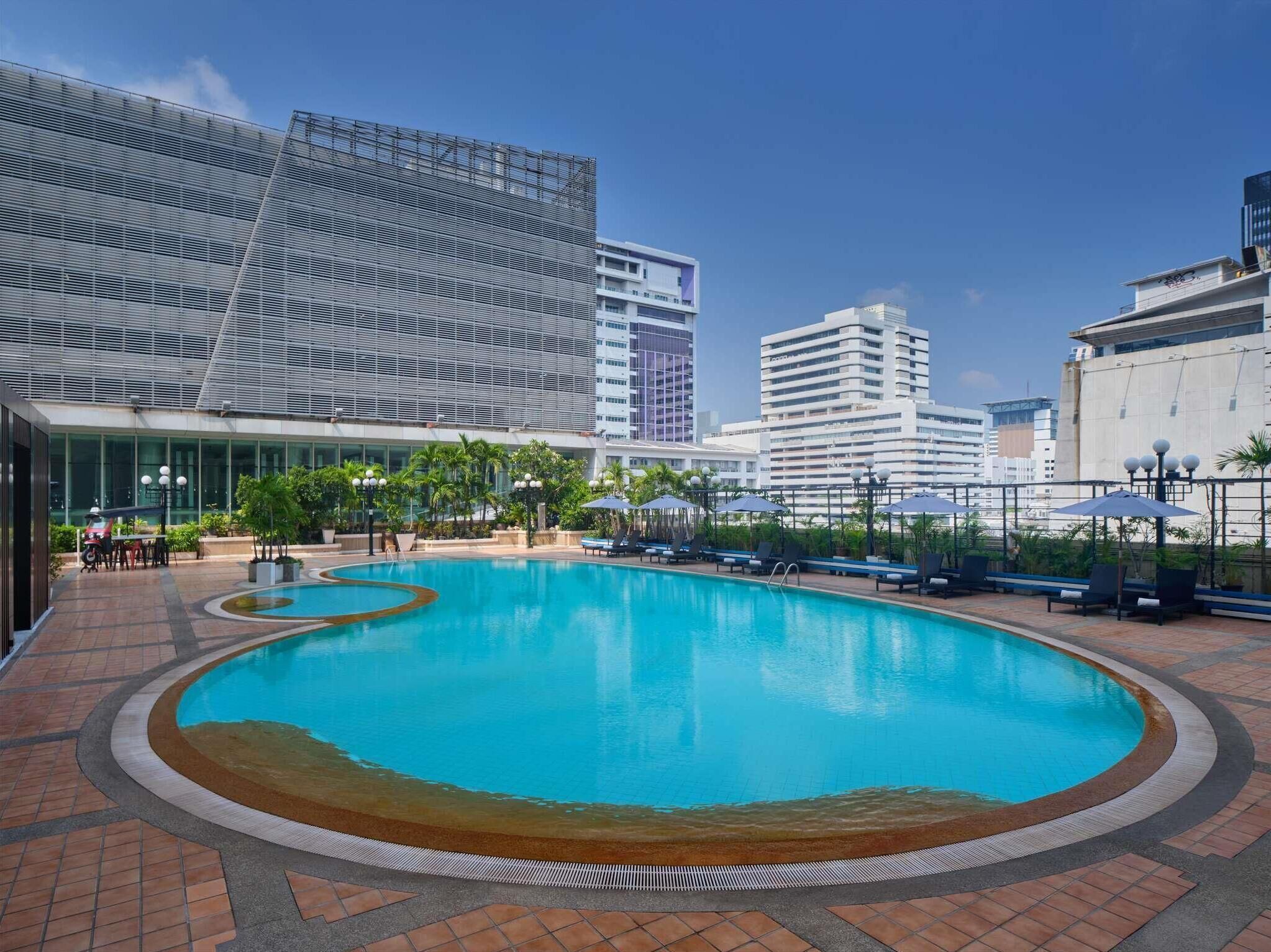 Outdoor pool, pool umbrellas, pool loungers
