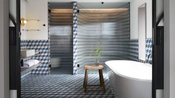 Bathroom features a bathtub and separate shower area.