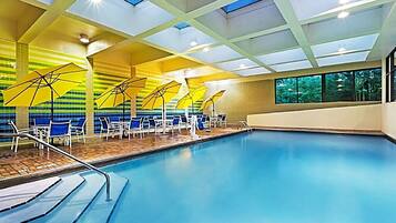 Indoor pool, open 6:00 AM to 11:00 PM, sun loungers