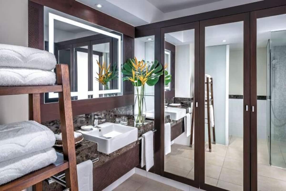 Shower, eco-friendly toiletries, hair dryer, bathrobes