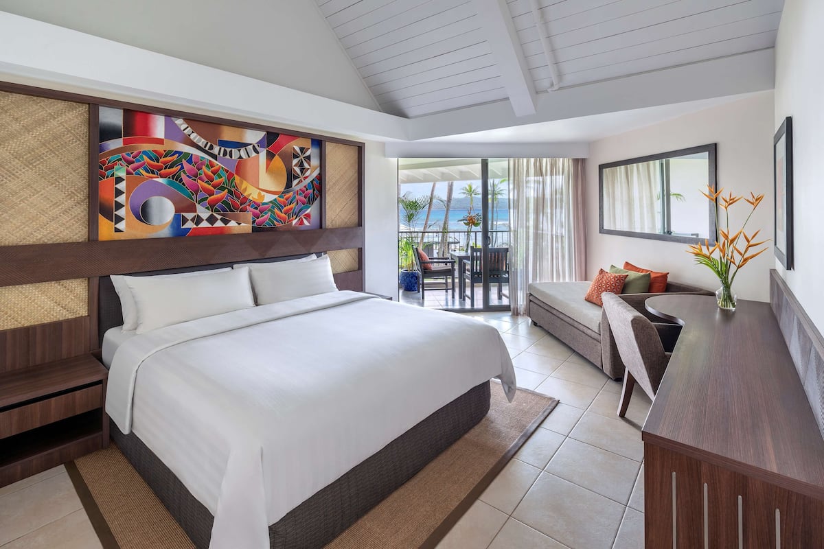 Yanuca Lagoon Deluxe King Room | 1 bedroom, premium bedding, in-room safe, desk