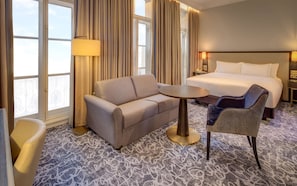 Family Room (Superior) | Living area | Flat-screen TV, pay movies