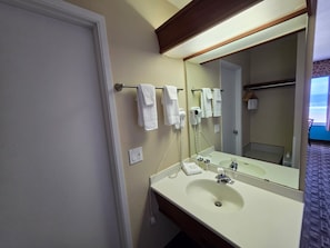 Standard Room, 1 King Bed, Ocean View | Bathroom | Combined shower/tub, free toiletries, hair dryer, towels