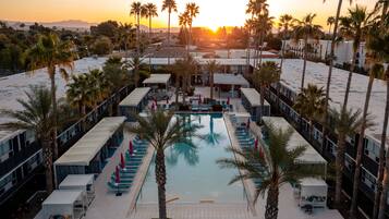Outdoor pool, open 7:00 AM to 10:30 PM, pool cabanas (surcharge)