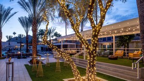 A resort with outdoor seating, a pool, and a covered patio area. - Hotel Adeline, Scottsdale, a Tribute Portfolio Hotel (Scottsdale)