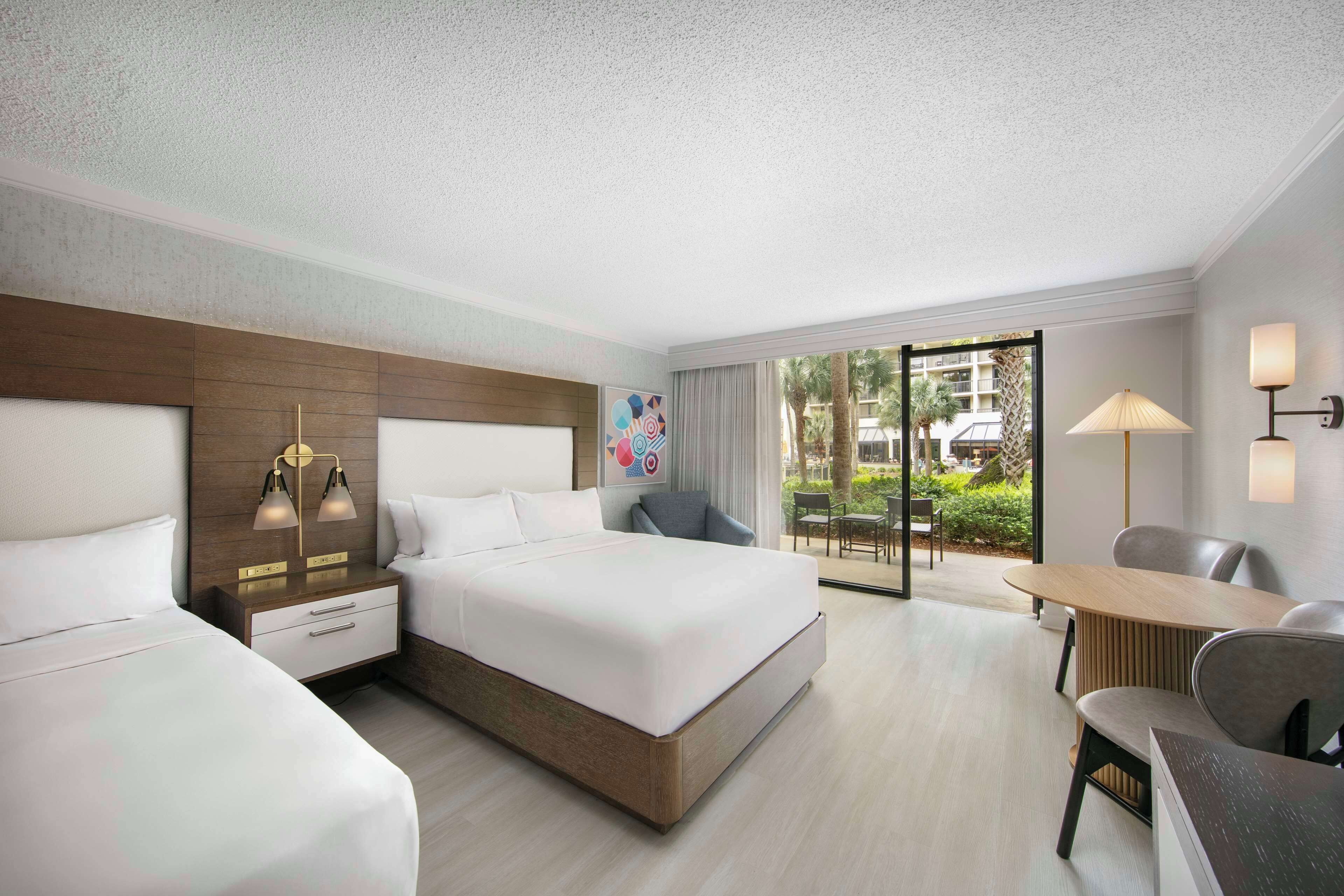 room, 2 queen beds, terrace, pool view | premium bedding, in-room safe, desk, laptop workspace