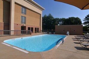 Seasonal outdoor pool, pool loungers