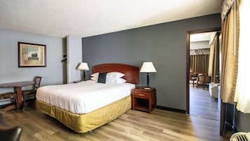 Family Room (1 King, 2 Queen) | Desk, laptop workspace, iron/ironing board, free WiFi